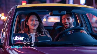 uber driver and passenger in a car with a sign that says uber