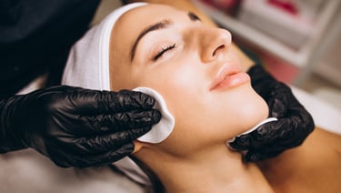 a woman getting a facial lift in a beauty salon