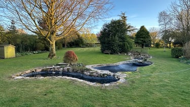 three pond overflow from water feature
