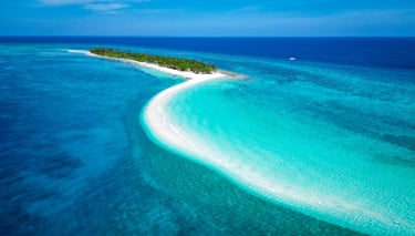 a small island with a small island in the middle of the ocean