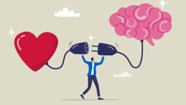 Man connecting heart and brain, symbolizing balance between emotion and intellect.