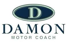 Official Damon Motor Coach logo featuring a blue oval with a silver letter D above the brand name.