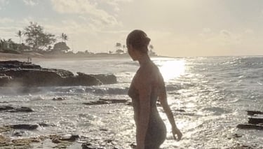 Girl looking out at ocean