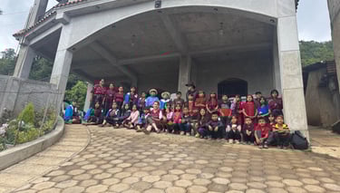 a group of people standing in front of a building