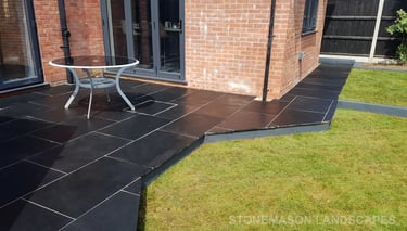 Corner Triangle Garden With Black & Grey Limestone Patio Sleeper Retaning Walls Multi-tier Level