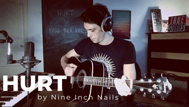 Guitar teacher performing 'Hurt' by Nine Inch nails in home studio