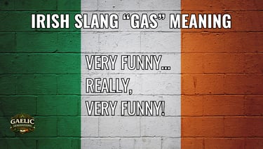 Irish slang gas meaning very funny text overlay on a green, white, and orange brick wall flag.