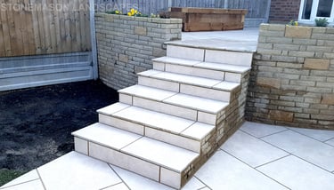 Elevated raised porcelain patio renovation and lawn relevelling 