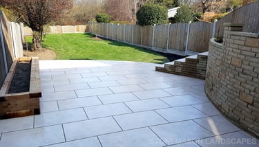 Elevated raised porcelain patio renovation and lawn relevelling 