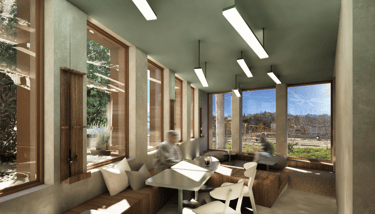 Espace café avec vue sur les quais de Saône. Espace avec des tables et un espace détentente