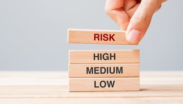 wooden blocks labeled with different risk tolerance levels