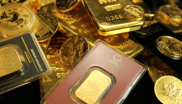 gold bars and coins representing long term potential of gold ira for retirement