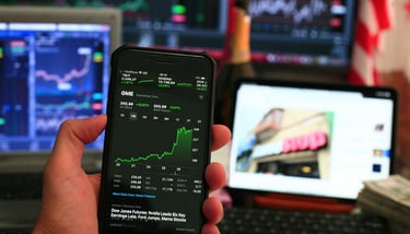phone showing investing chart symbolizing market volatility