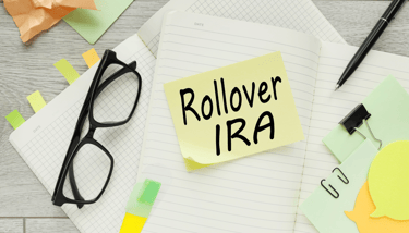 glasses and sticky notes for performing rollover to roth ira