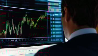 investor looking at candlestick charts and using margin
