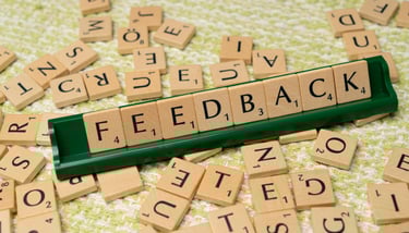 block letters forming word "feedback" symbolizing blog post for augusta precious metals customer reviews