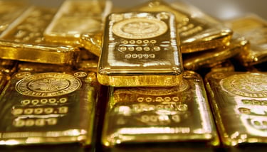 gold bullion bars in pile