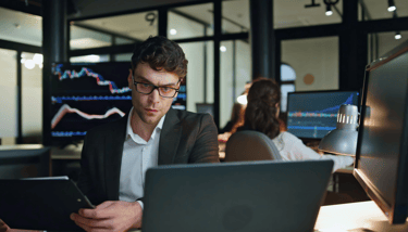 an expert investor looking at hedge fund charts and data