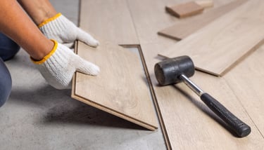 General contractor repairing floor.