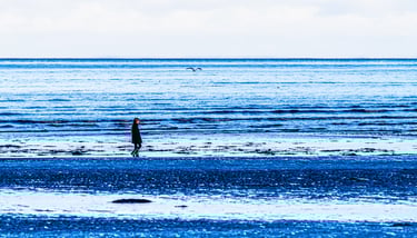 Girl walking on the beach