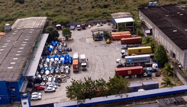 a large group of vehicles parked in a parking lot