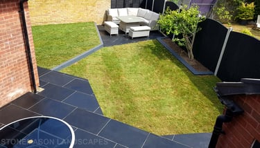 Corner Triangle Garden With Black & Grey Limestone Patio Sleeper Retaning Walls Multi-tier Level