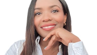 a woman with long hair and a white shirt
