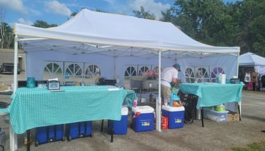 a pop-up with a table with a table cloth
