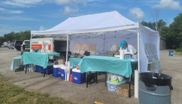 a tenter with a table with a table cloth