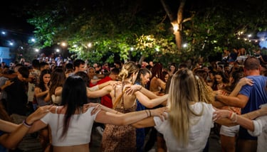 a group of people dancing in a circle