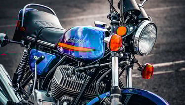 a motorcycle Kawasaki 750 H2 parked in a parking lot