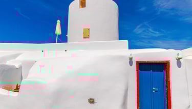 a lighthouse tower with umbrellas and umbrellas