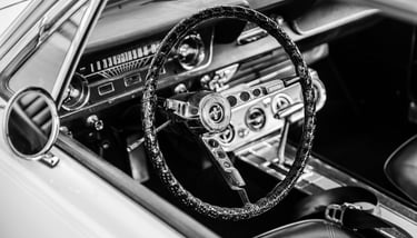 a steering wheel and steering wheel of a ford Mustang