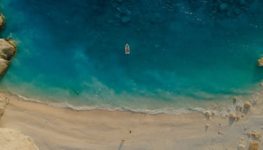 drone shot beach sunset boat trip zante zakynthos sunset