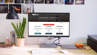 a computer monitor screen showing a desktop computer screen displaying a website page