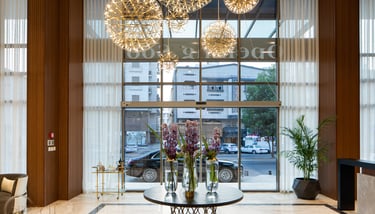 Luxurious hotel lobby with modern furnishings and elegant lighting