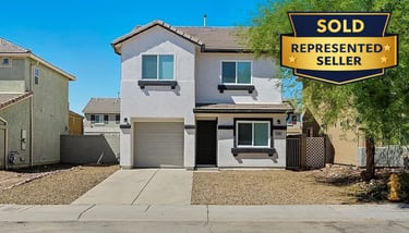 a sold sign for a home in a residential neighborhood