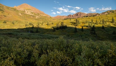 Bellview Peak and West Maroon Pass in luminous September evening sunlight