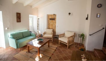 a living room with a couch and a table