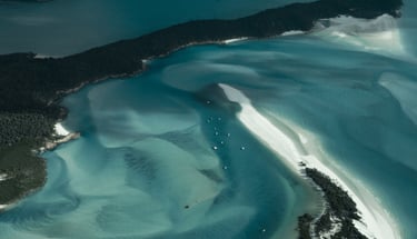 a view of a body of water with a small island in the background