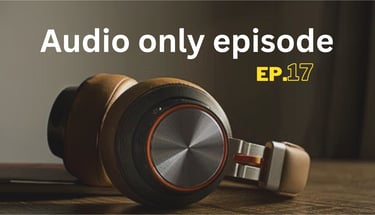 a pair of headphones with a laptop and headphones on a table