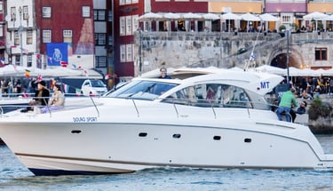 Private luxury yacht cruising on the Douro River in Porto