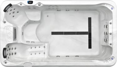 a hot tub with a black and white tile