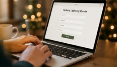 A person using a laptop computer to fill out an online form for holiday light installation.
