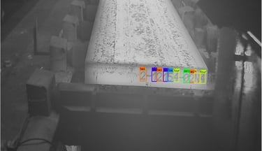 a large metal pipework with a colorful colored squares