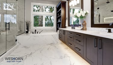 Luxury bathroom renovation with frameless glass shower and heated tile floors in Lake Forest IL.