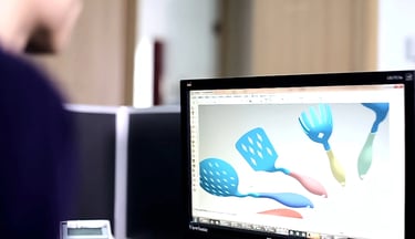 Designer showing his design work in front of computer