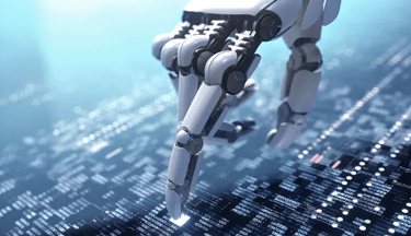 a robot hand holding a piece of technology