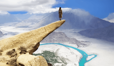 A girl standing at marsur rock skardu