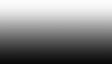 a black and white photo of a man in a suit and tie